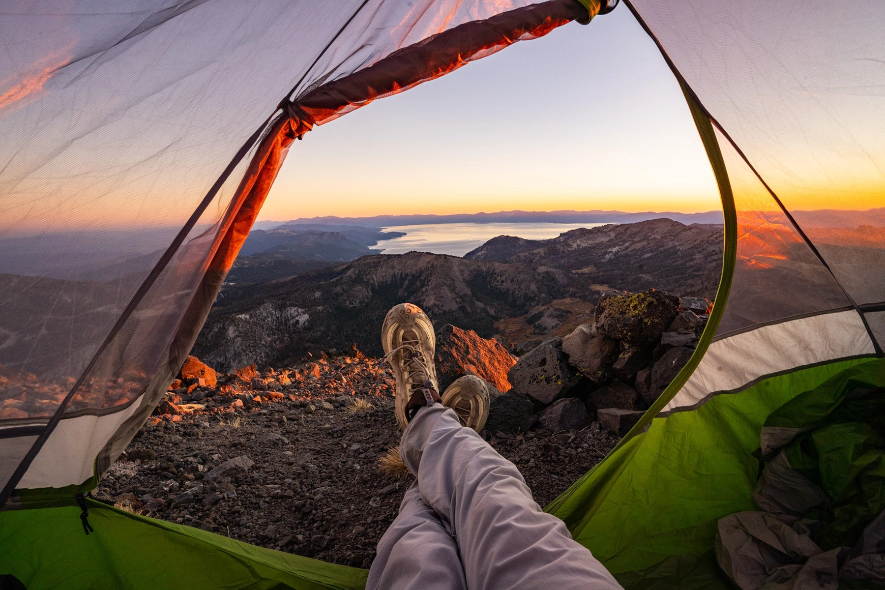 Frame within a frame tent photo of mountains