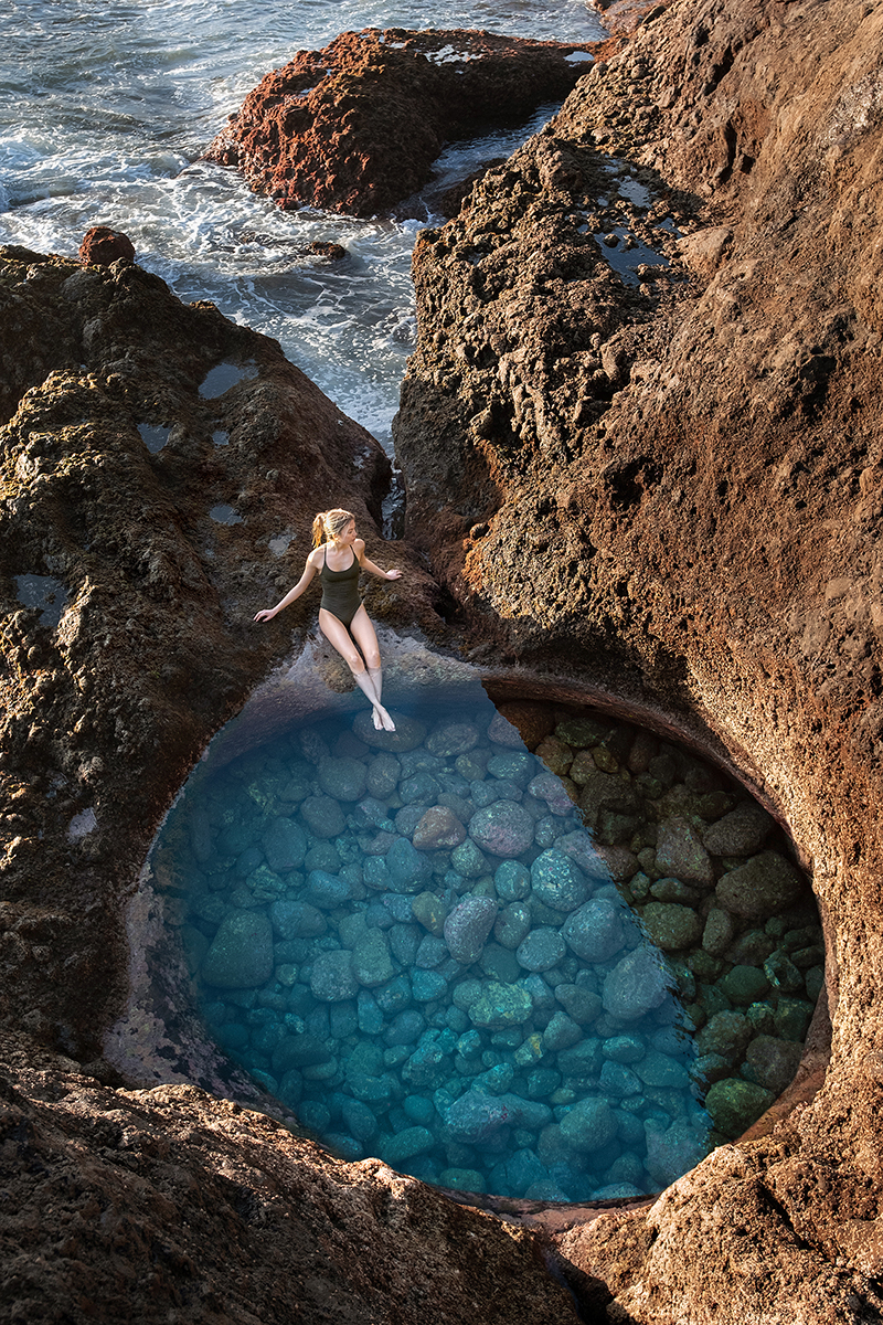 Woman in tidal pool.