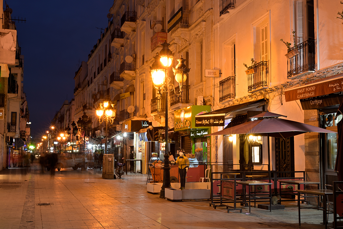 Street scene with tables and street lights