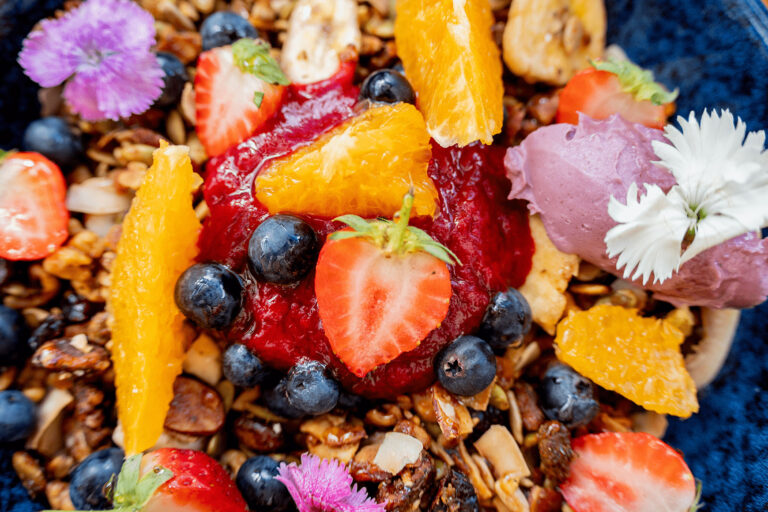 Granola, strawberries and other fruits