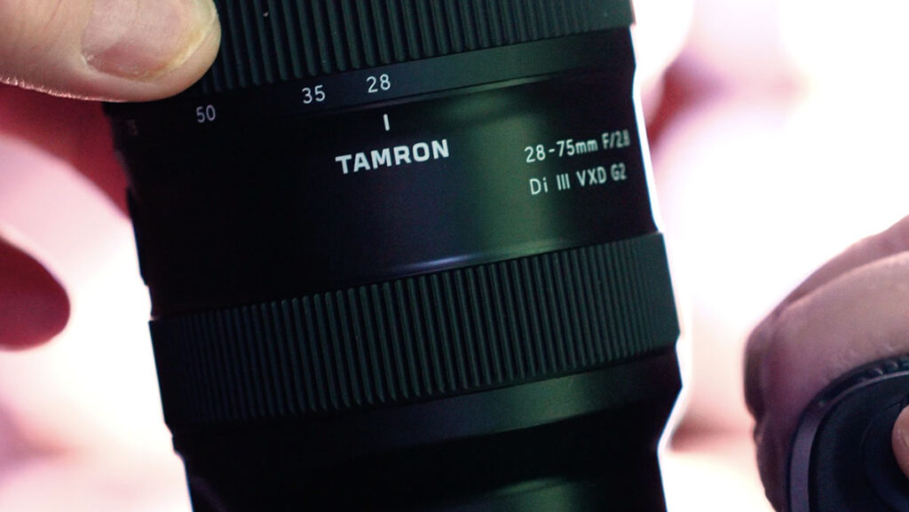 An extreme close-up of a Tamron lens that can be used to master advanced cinematography camera techniques.