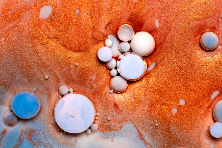 Milk colored with acrylics and added vegetable oil and dishwashing soap.