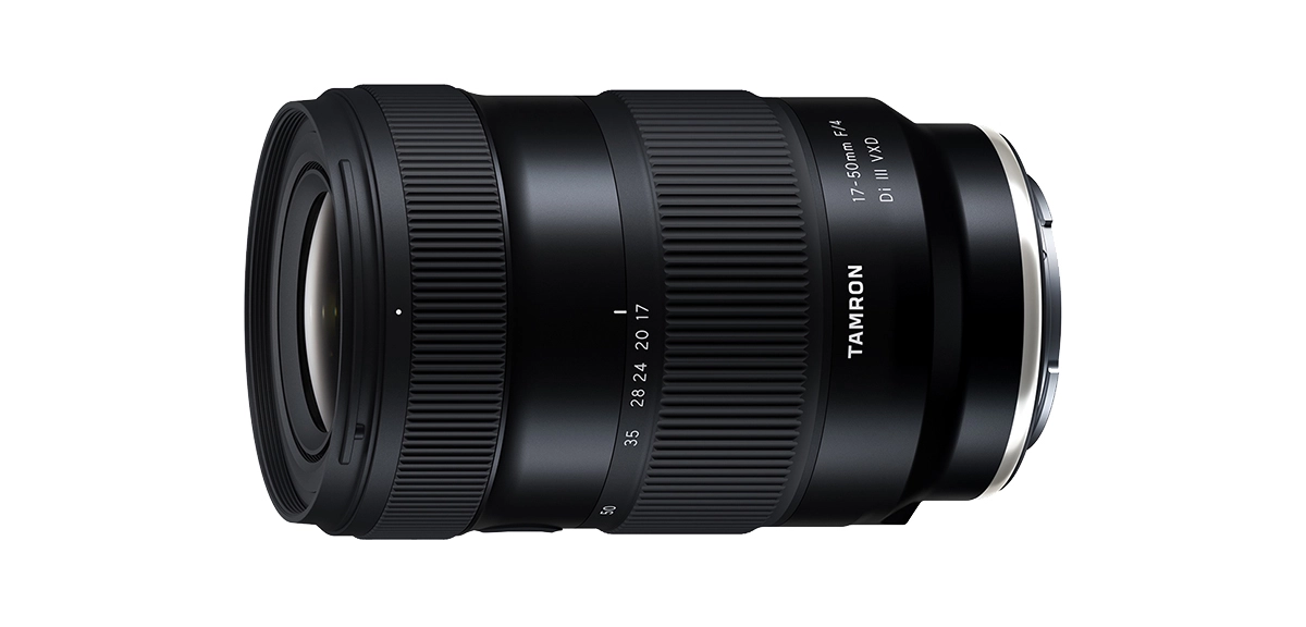 Side view of the Tamron 17-50mm F/4 Di III VXD lens, showcasing the zoom and focus rings, used as an example of a constant F-number lens for photography.