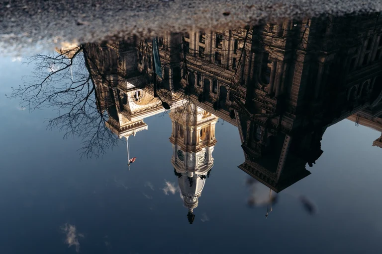 A reflection in the water of a castle
