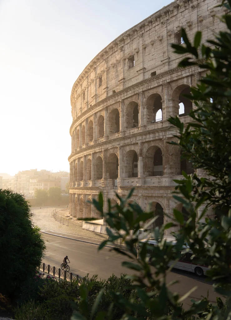 Rome's Colosseum with first rays of sunlight hitting the side