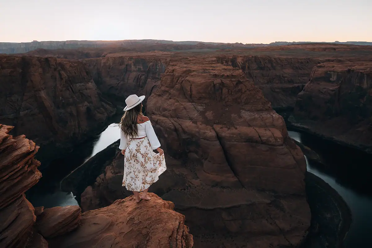 Woman on the cliff in Horseshoe Bend, Arizona