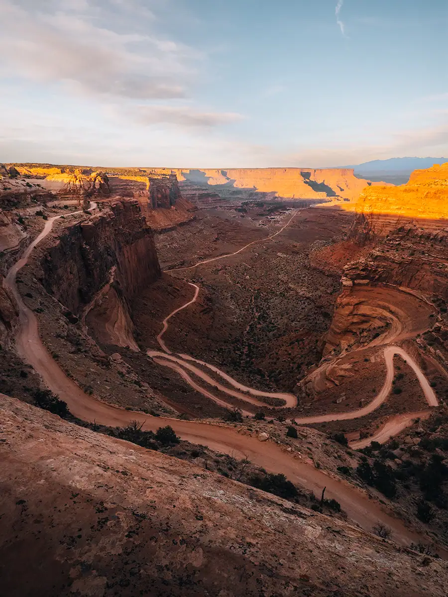 A photo of winding roads in Canyonlands National Park at sunset.