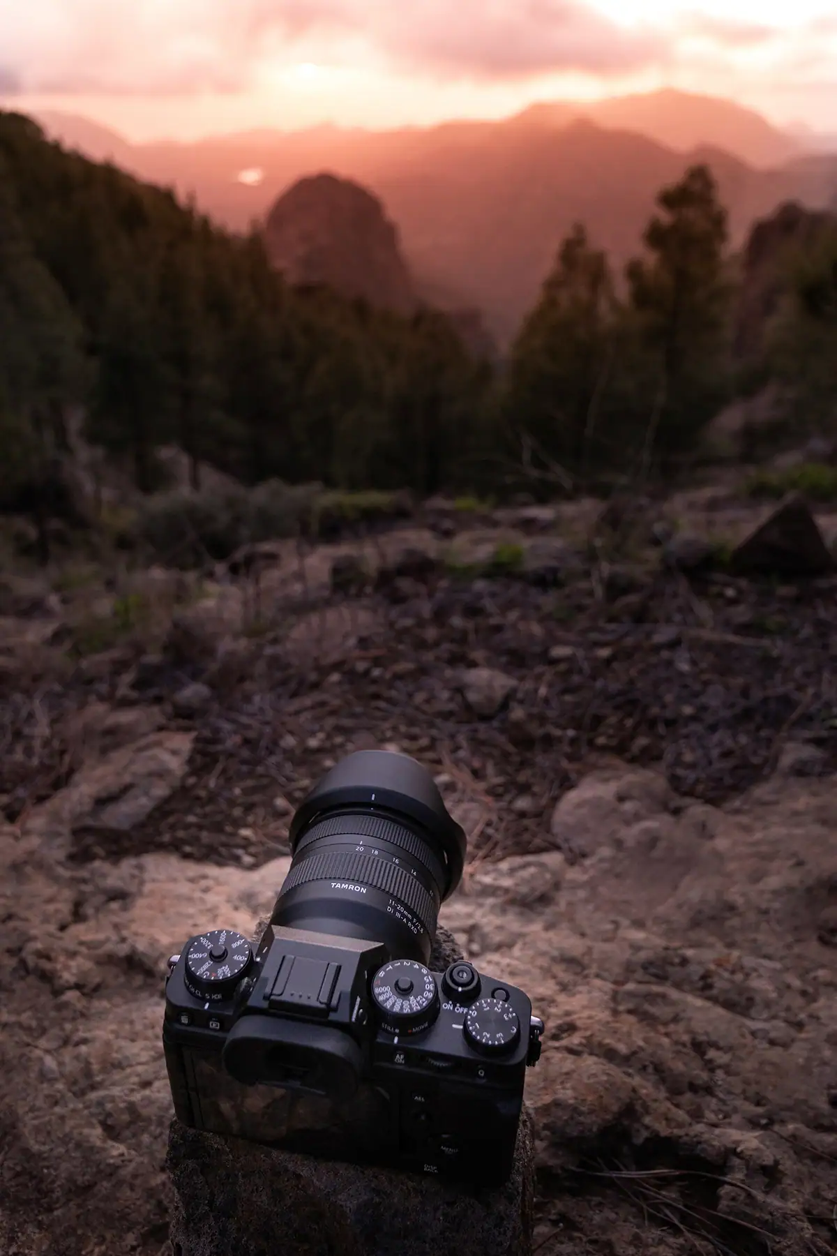 Camera with Tamron wide-angle lens for Milky Way photography setup.