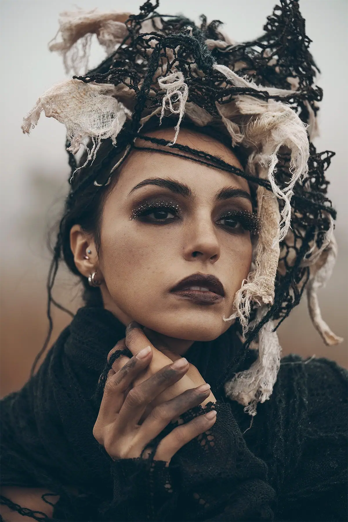 Portrait photographed with a Tamron 90mm prime lens showing sharp facial detail and soft background blur.