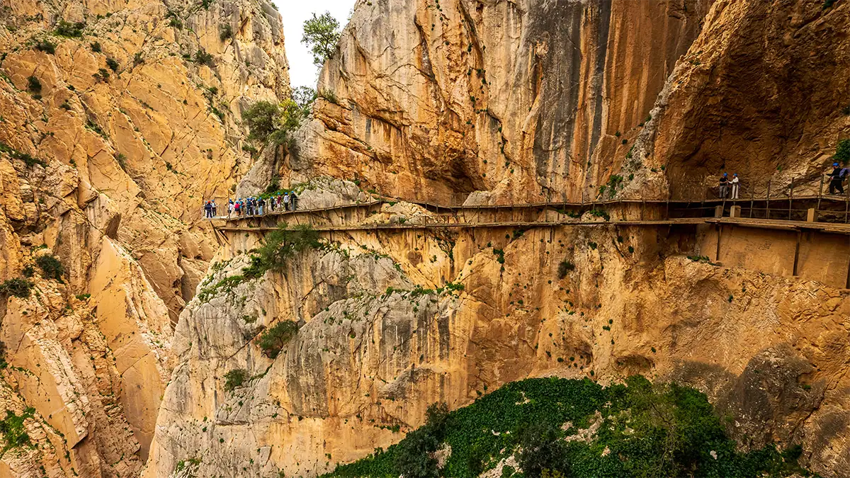 The Caminito del Rey walkway curves along steep rock cliffs in Andalusia, photographed with the Tamron 16-30mm F2.8 G2 travel lens.