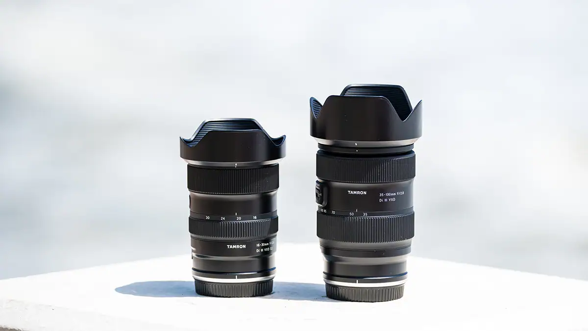 Tamron 16-30mm F2.8 and Tamron 35-100mm F2.8 lenses shown together as a compact two-lens travel photography kit.