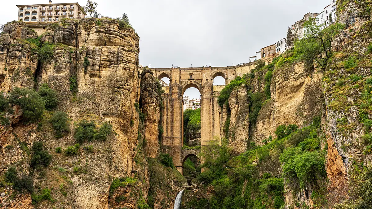 Puente Nuevo spans the dramatic gorge in Ronda, Spain, photographed with the Tamron 35-100mm F2.8 travel photography lens.