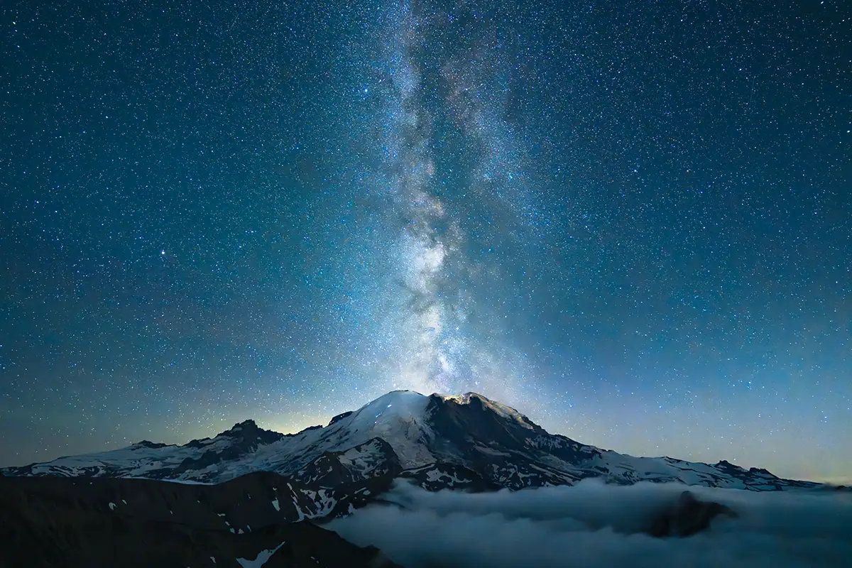 A Milky Way with Washington's Mount Rainier in the background.
