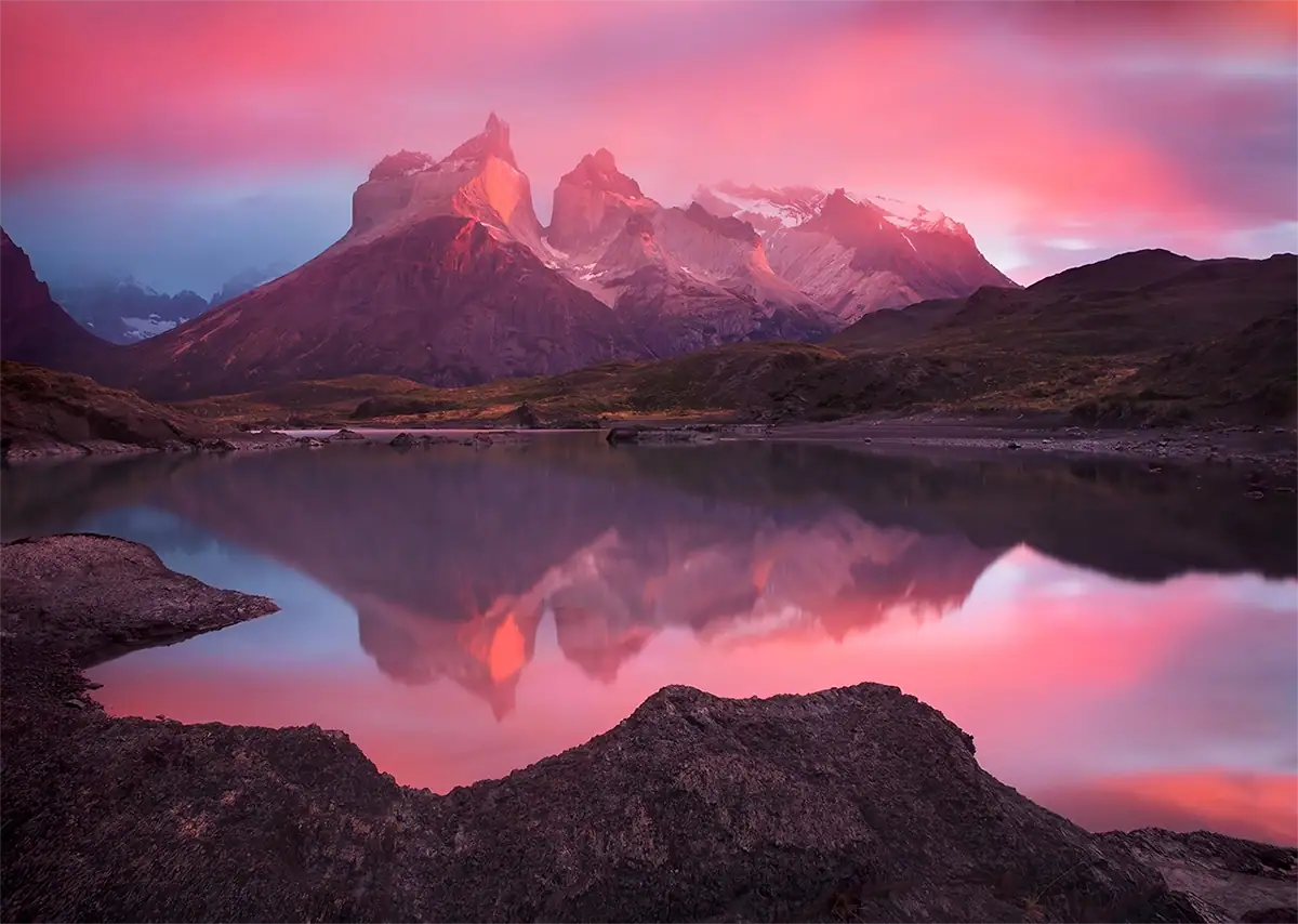 Mountain landscape at sunrise with a bright sky and darker foreground balanced in a single image using a graduated neutral density filter.