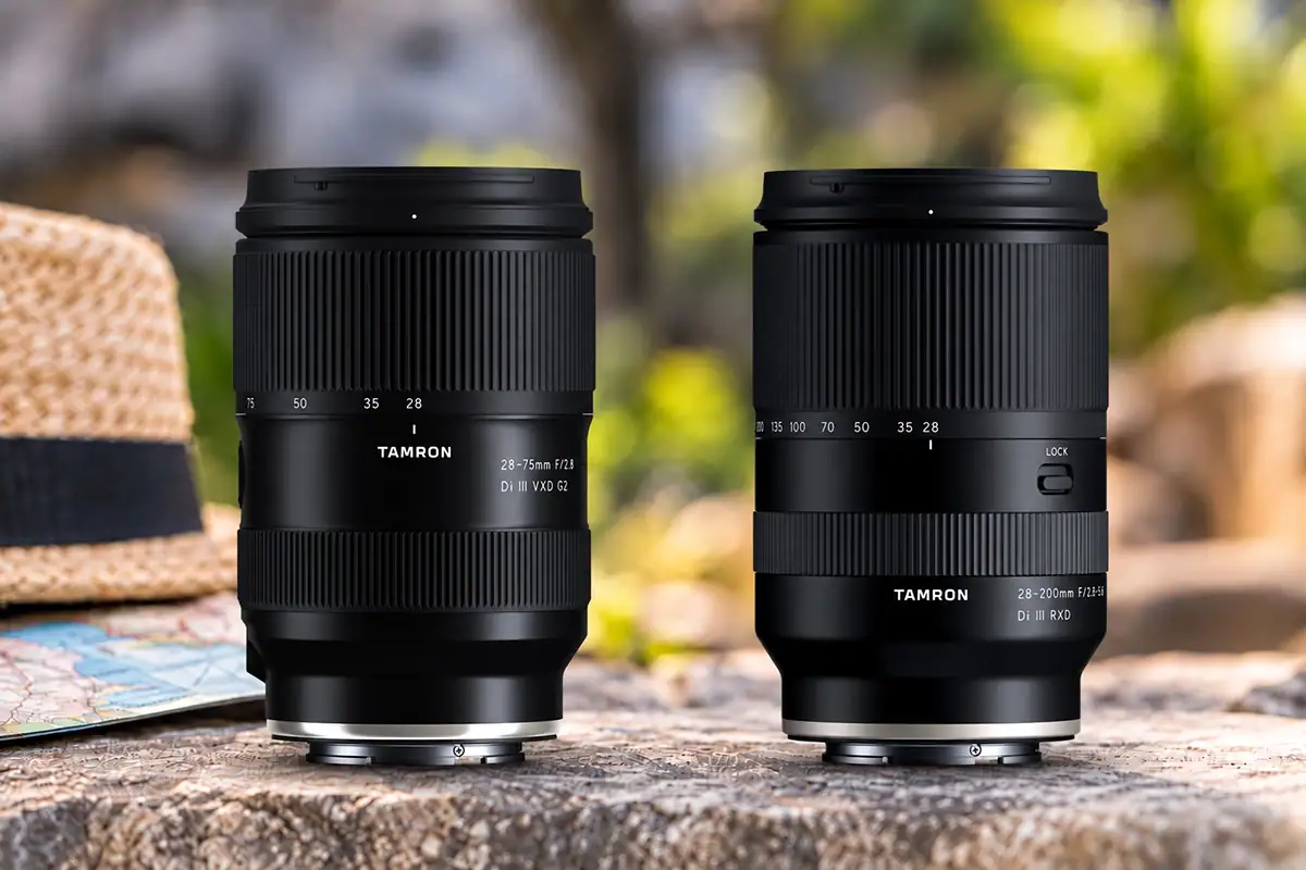 Side-by-side comparison of the Tamron 28-75mm F2.8 G2 and 28-200mm F2.8-5.6 zoom lenses, showing their nearly identical physical size.